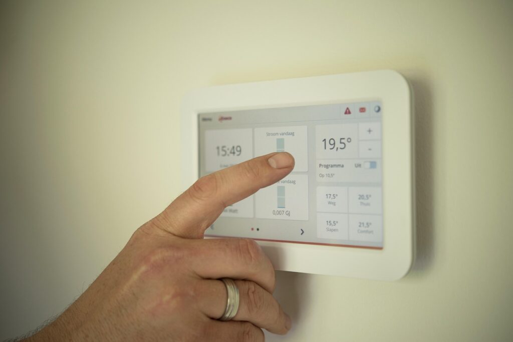 Home tablet, heating, man, pointing, manual, technology, person, male, computer, home, modern, system, energy, control, people, temperature, app, heating, heating, heating, heating, heating, temperature, temperature, temperature, temperature